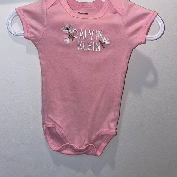 5/$15 Calvin Klein Pink Baby Onesie - Picture 1 of 4